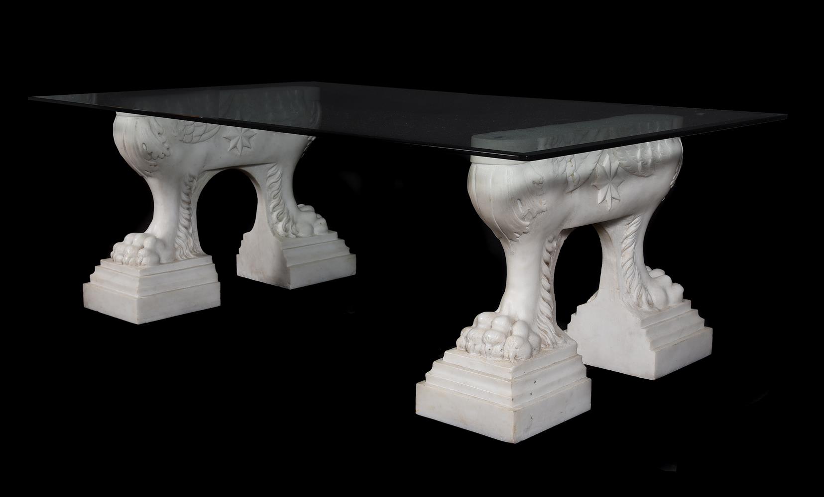 A PAIR OF WHITE MARBLE MONOPODIA TABLE SUPPORTS, AFTER THE ANTIQUE