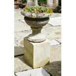 A PAIR OF COTSWOLD STONE VASES, EARLY 19TH CENTURY