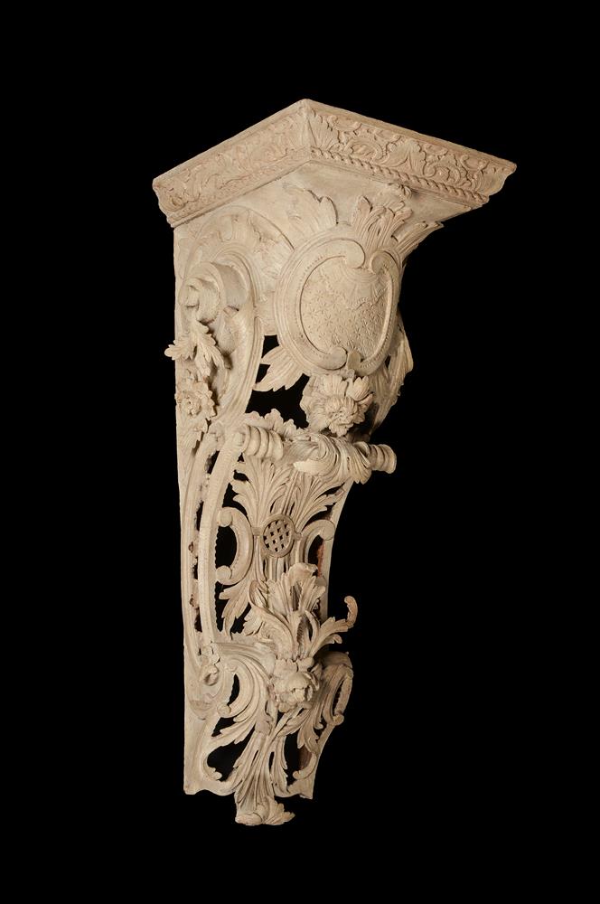 A GEORGE II CARVED PINE AND PAINTED WALL BRACKET, CIRCA 1750