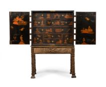 A BLACK LACQUER AND GILT CHINOISERIE DECORATED CABINET, EARLY 18TH CENTURY