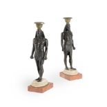 A PAIR OF BRONZE CANDLESTICKS IN THE FORM OF ANTINOUS AS OSIRIS, ITALIAN OR FRENCH, 19TH CENTURY