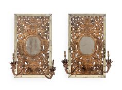 A PAIR OF CONTINENTAL GILT METAL REPOUSSE GIRANDOLE MIRRORS, IN LATE 17TH CENTURY STYLE