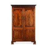 A GEORGE III MAHOGANY WARDROBE, IN THE MANNER OF THOMAS CHIPPENDALE, CIRCA 1770