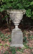 A CAST STONE URN IN THE NEOCLASSICAL STYLE, 20TH CENTURY