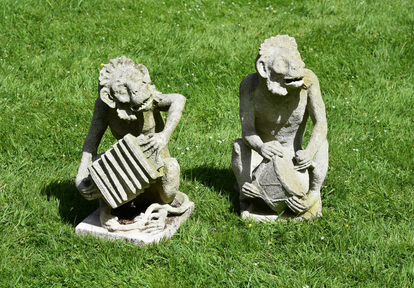 A PAIR OF CARVED STONE MONKEYS, 19TH CENTURY