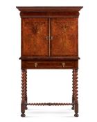 A FIGURED WALNUT AND INLAID CABINET, CIRCA 1680 AND LATER