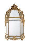 A REGENCÉ CARVED GILTWOOD MIRROR, INSCRIBED 'E. Caris, Faugeais, Chab', DATED 1719 TO REVERSE