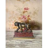 A BRONZE FIGURE OF A PACING LION, ITALIAN, 18TH/19TH CENTURY