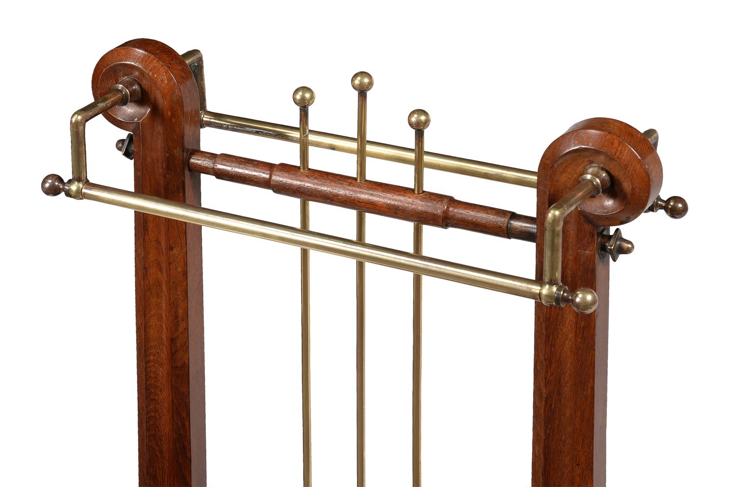 AN EARLY VICTORIAN OAK AND BRASS STICK STAND, CIRCA 1840 - Image 3 of 3