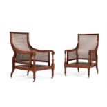 A PAIR OF REGENCY MAHOGANY AND CANED LIBRARY BERGERE ARMCHAIRS, CIRCA 1815