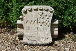 A CARVED LIMESTONE ENTABLATURE ARMORIAL FRAGMENT, PROBABLY EARLY 19TH CENTURY
