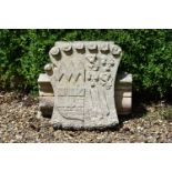 A CARVED LIMESTONE ENTABLATURE ARMORIAL FRAGMENT, PROBABLY EARLY 19TH CENTURY