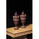 A PAIR OF FRENCH PORPHYRY AND ORMOLU MOUNTED LIDDED VASES, IN NEOCLASSICAL STYLE