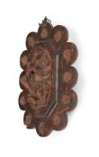 Y AN OVAL CARVED WOOD RELIEF OF THE VIRGIN AND CHILD WITH ST JOHN THE BAPTIST, FLEMISH