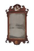 A GEORGE II MAHOGANY AND PARCEL GILT WALL MIRROR, MID 18TH CENTURY
