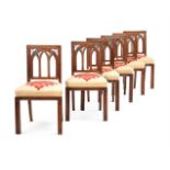 A SET OF SIX WALNUT DINING CHAIRS, IN GOTHIC REVIVAL STYLE, FIRST HALF 19TH CENTURY