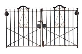 A PAIR OF IRON GATES BY S. COWELL NORWICH, LATE 19TH/EARLY 20TH CENTURY