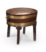 A GEORGE III MAHOGANY AND BRASS BOUND WINE COOLER, CIRCA 1760