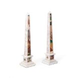 A PAIR OF SPECIMEN HARDSTONE SET AND GILT METAL MOUNTED OBELISKS, IN EARLY 19TH CENTURY STYLE