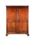 A GEORGE III MAHOGANY WARDROBE, IN THE MANNER OF THOMAS CHIPPENDALE, CIRCA 1780