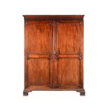 A GEORGE III MAHOGANY WARDROBE, IN THE MANNER OF THOMAS CHIPPENDALE, CIRCA 1780