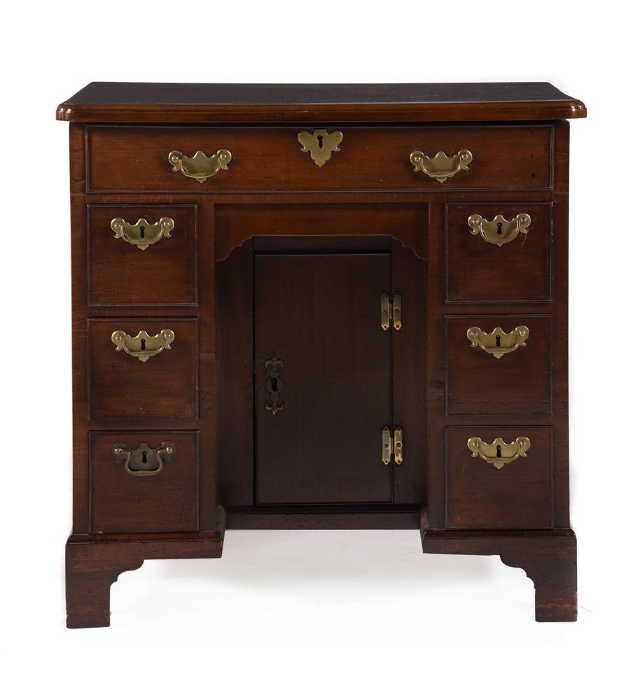 A GEORGE III MAHOGANY COMBINED KNEEHOLE DESK AND DRESSING TABLE, CIRCA 1760