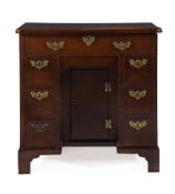 A GEORGE III MAHOGANY COMBINED KNEEHOLE DESK AND DRESSING TABLE, CIRCA 1760