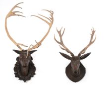 TWO CARVED WOOD STAG'S HEADS, PROBABLY AUSTRIAN, 19TH CENTURY