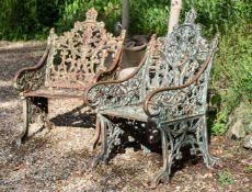 A PAIR OF CAST IRON CHAIRS, IN THE COALBROOKDALE 'GOTHIC' PATTERN, LATE 20TH CENTURY
