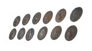TWELVE BRONZED OVAL PLAQUES OF ROMAN EMPERORS, IN THE EARLY 19TH CENTURY MANNER