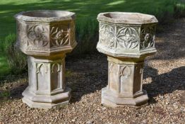 A PAIR OF CAST STONE PLANTERS AND PEDESTALS, IN THE GOTHIC STYLE, 20TH CENTURY