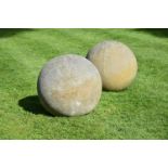 A LARGE PAIR OF LIMESTONE BALLS, 20TH CENTURY