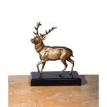 A REGENCY GILT BRONZE FIGURE OF A STAG, CIRCA 1820