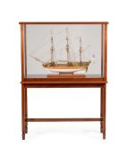 A MAHOGANY CASED MODEL OF HMY ROYAL CAROLINE ON STAND, IN GEORGE III STYLE, CONTEMPORARY