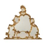 A CARVED GILTWOOD MIRROR, IN MID-18TH CENTURY STYLE