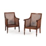 A MATCHED PAIR OF REGENCY MAHOGANY LIBRARY BERGERE ARMCHAIRS, CIRCA 1815