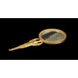 A GILT BRONZE HAND MIRROR, IN THE EMPIRE EGYPTIAN REVIVAL MANNER, FRENCH, 19TH CENTURY