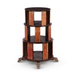 A MAHOGANY CYLINDICAL BOOKCASE, IN REGENCY STYLE, LATE 20TH CENTURY