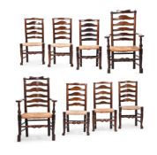 A HARLEQUIN SET OF EIGHT ASH LADDER BACK CHAIRS, NORTH WEST ENGLAND, PROBABLY BILLINGE NEAR WIGAN