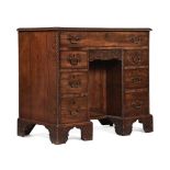 A GEORGE III MAHOGANY KNEEHOLE DESK, LATE 18TH CENTURY