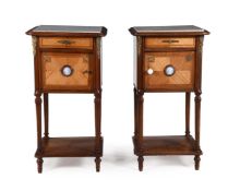 A PAIR OF FRENCH MAHOGANY AND GILT METAL MOUNTED BEDSIDE TABLES