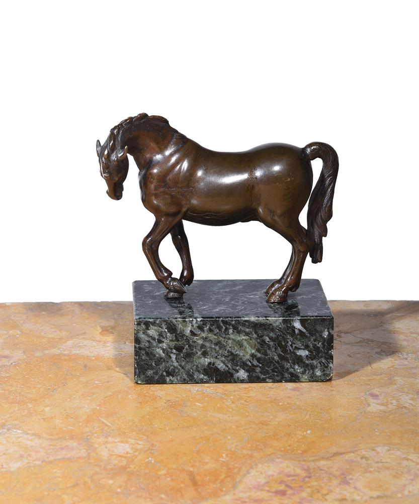 A BRONZE FIGURE OF A PRANCING HORSE, ITALIAN, CIRCA 1700