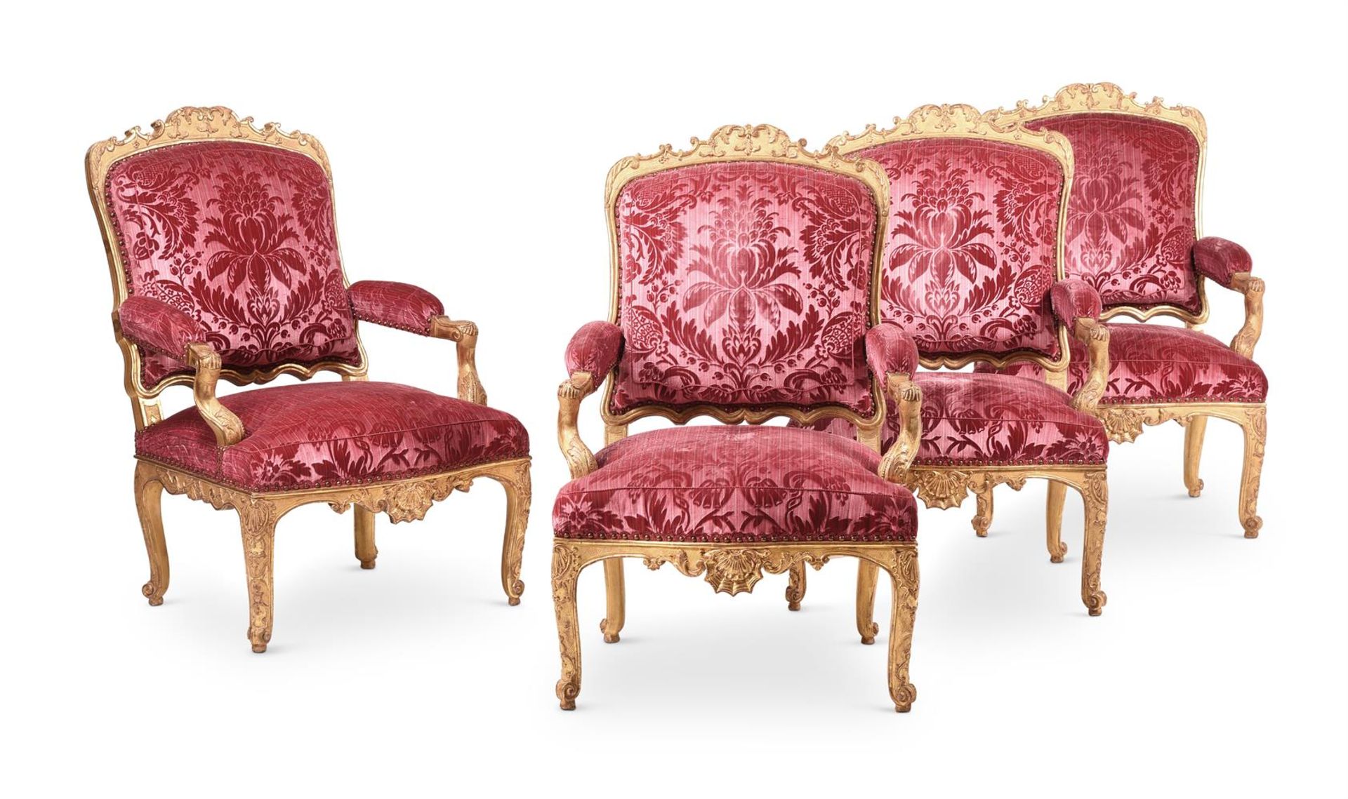 A SET OF FOUR RÉGENCE GILTWOOD FAUTEUILS A LA REINE, EARLY 18TH CENTURY