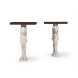 A PAIR OF WHITE MARBLE MONOPODIA CONSOLE TABLES WITH RED PORPHYRY VENEERED TOPS, 20TH CENTURY