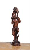 A CARVED WOOD FIGURE OF A FAUN WITH YOUNG BACCHUS, CIRCLE OF JAN BAPTISTE XAVERY (1697-1742)