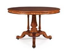 A VICTORIAN SATINWOOD, MARQUETRY AND PARCEL GILT CENTRE TABLE, IN THE MANNER OF HOLLAND & SONS