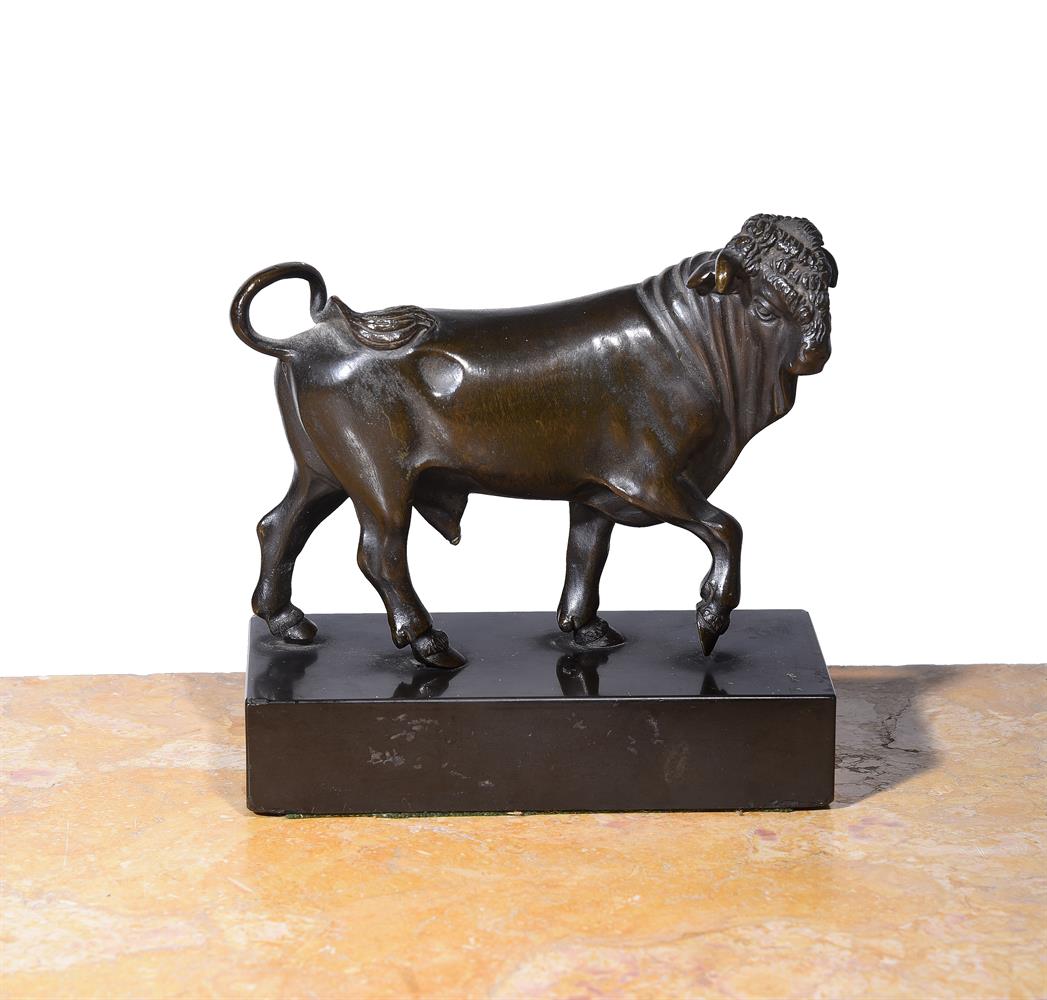 A BRONZE FIGURE OF A STRIDING BULL, ITALIAN, 18TH/19TH CENTURY