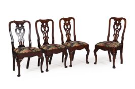 A SET OF FOUR GEORGE II WALNUT DINING CHAIRS, CIRCA 1740