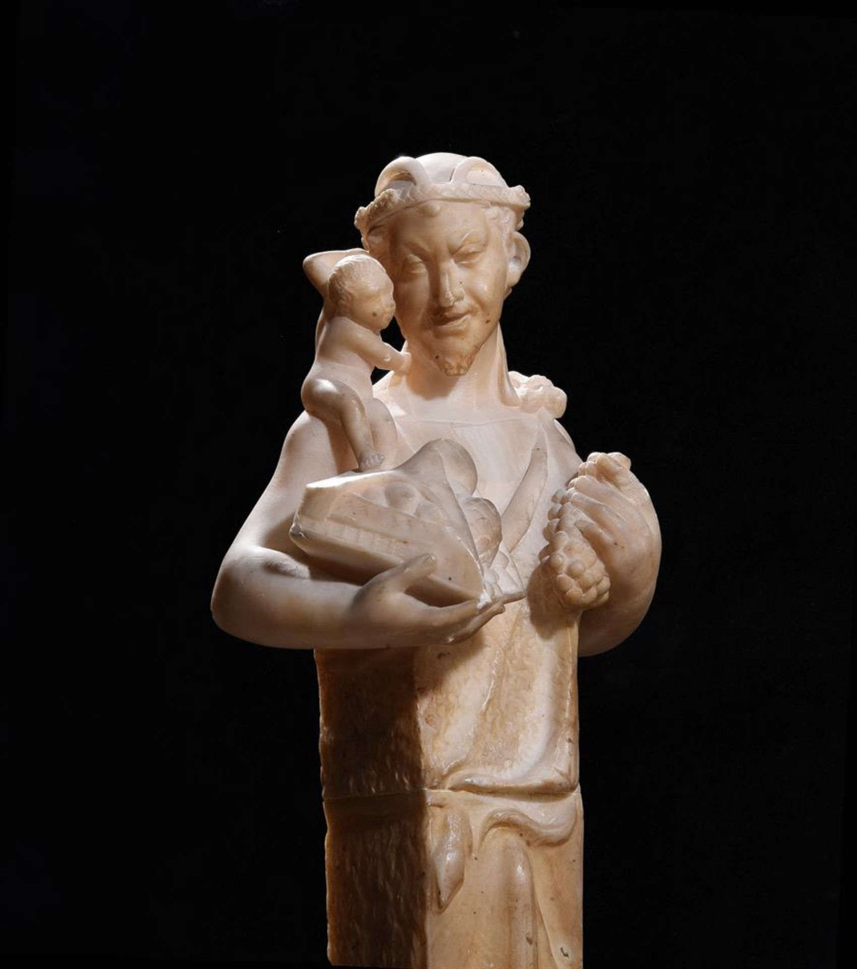 A CARVED ALABASTER HERM DEPICTING A SATYR WITH INFANT BACCHUS, ITALIAN, LATE 18TH/EARLY 19TH CENTURY - Image 2 of 3