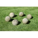 A SET OF SIX STONE COMPOSITION BALLS, 20TH CENTURY